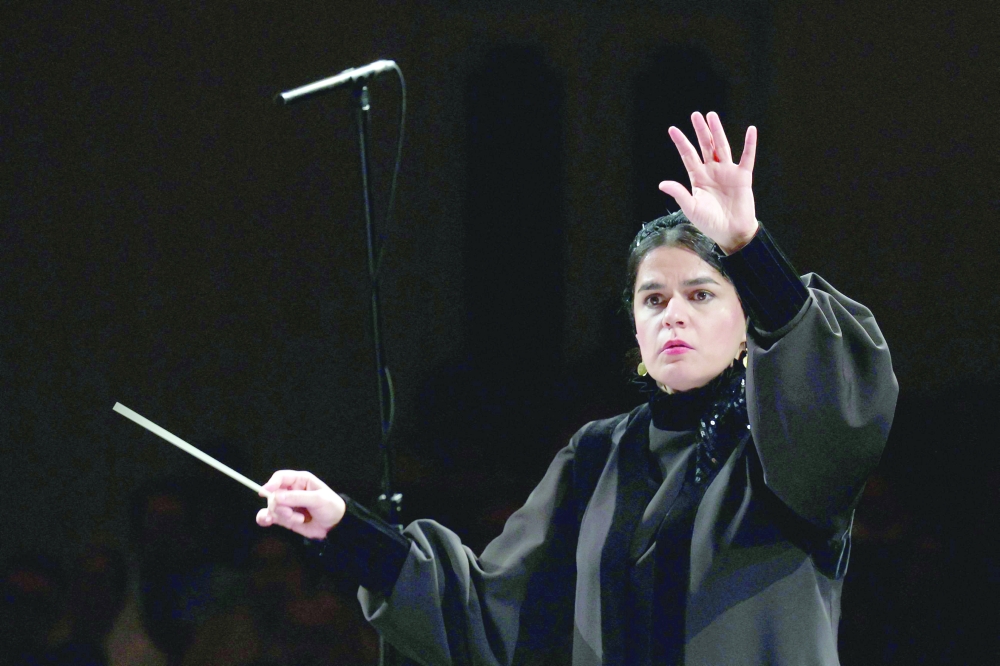 Paniz Faryousefi leads the Iranian symphony orchestra at the Vahdat hall in Tehran. — AFP