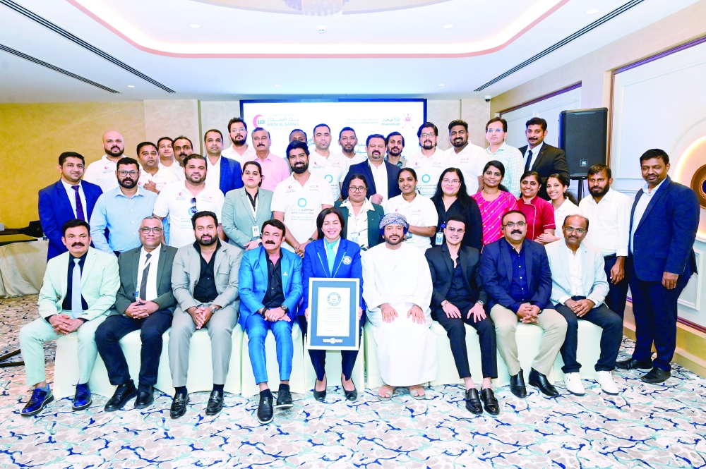 Dr Muhanna bin Nasser al Musalhi with the screening team who set a new Guinness World Record.