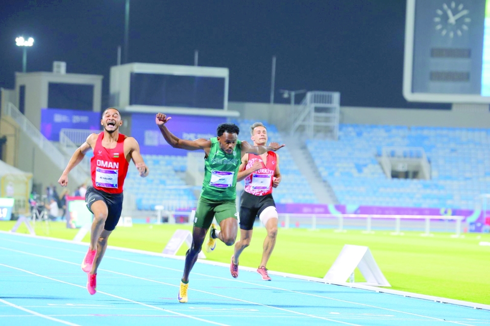 Ali bin Anwar al Balushi finishes first in the 100 meters final at the Islamic Solidarity Games 2025 in Riyadh on Monday.
