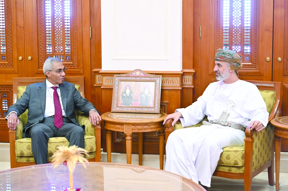 Khalid bin Hilal al Maawali with Yasser Mohamed Ahmed Shaaban in Muscat on Tuesday.