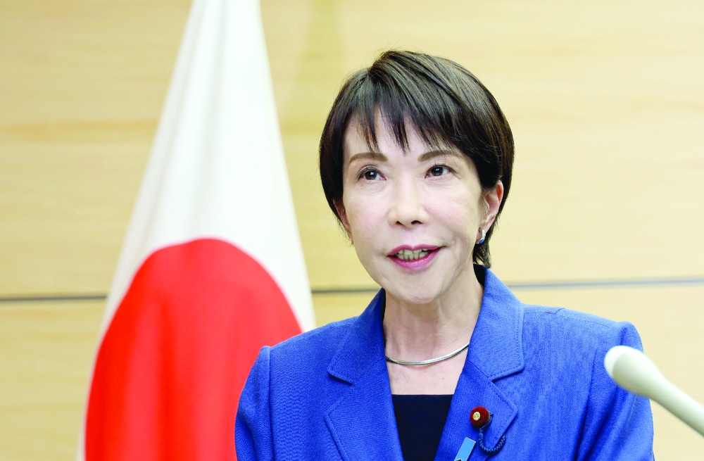 Japan's Prime Minister Sanae Takaichi speaks to reporters at the Prime Minister's office in Tokyo. — AFP