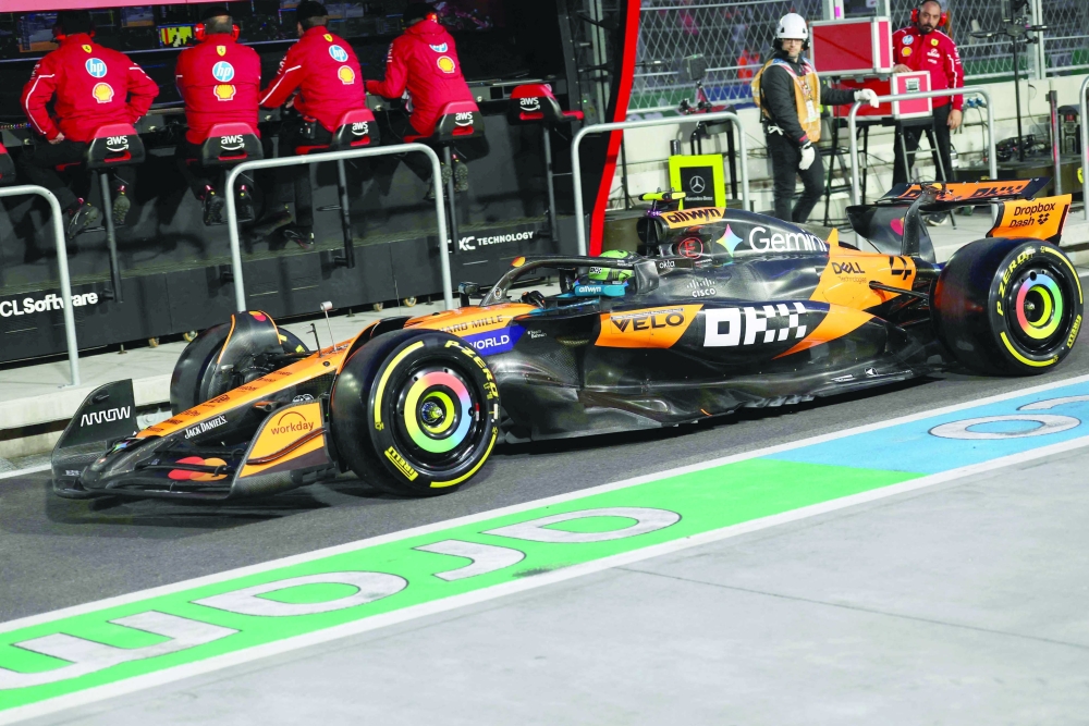 McLaren's British driver Lando Norris drives out of pit lane to begin the first practice session for the Las Vegas Formula One Grand Prix at the Las Vegas Strip Circuit in Las Vegas, Nevada, on November 20, 2025. (Photo by Patrick T. Fallon / AFP)
