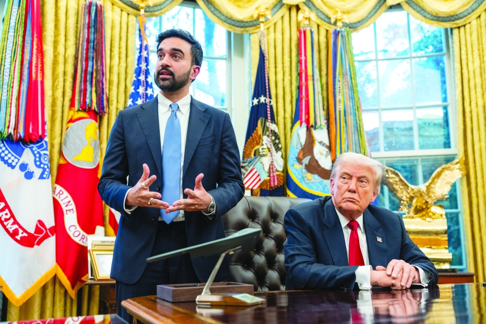 President Donald Trumpa and New York Mayor-elect Zohran Mamdani speak to reporters in the Oval Office. 