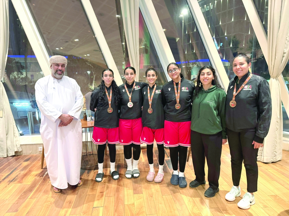 Oman women’s national 3x3 basketball team poses with the bronze medals.