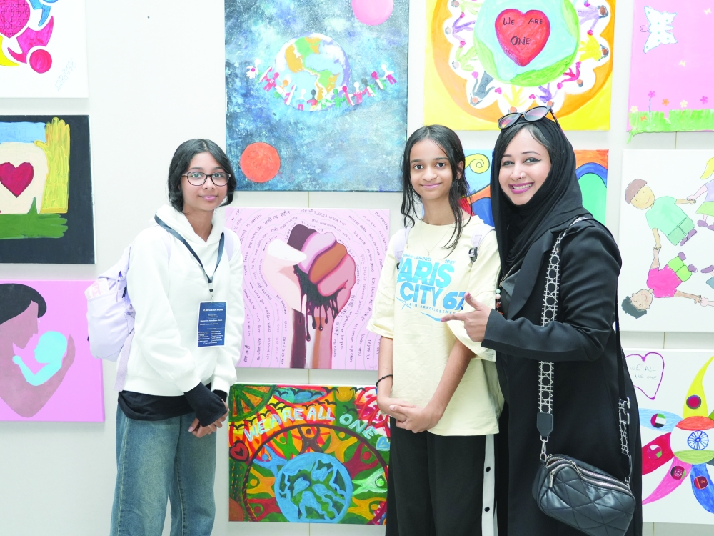 Dr Hafsa Banu with the art students in Muscat