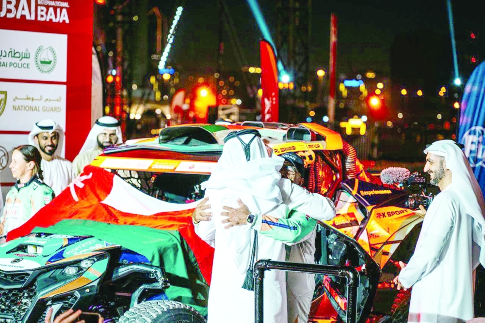 Oman's Hamed al Wahaibi celebrates after claiming third.