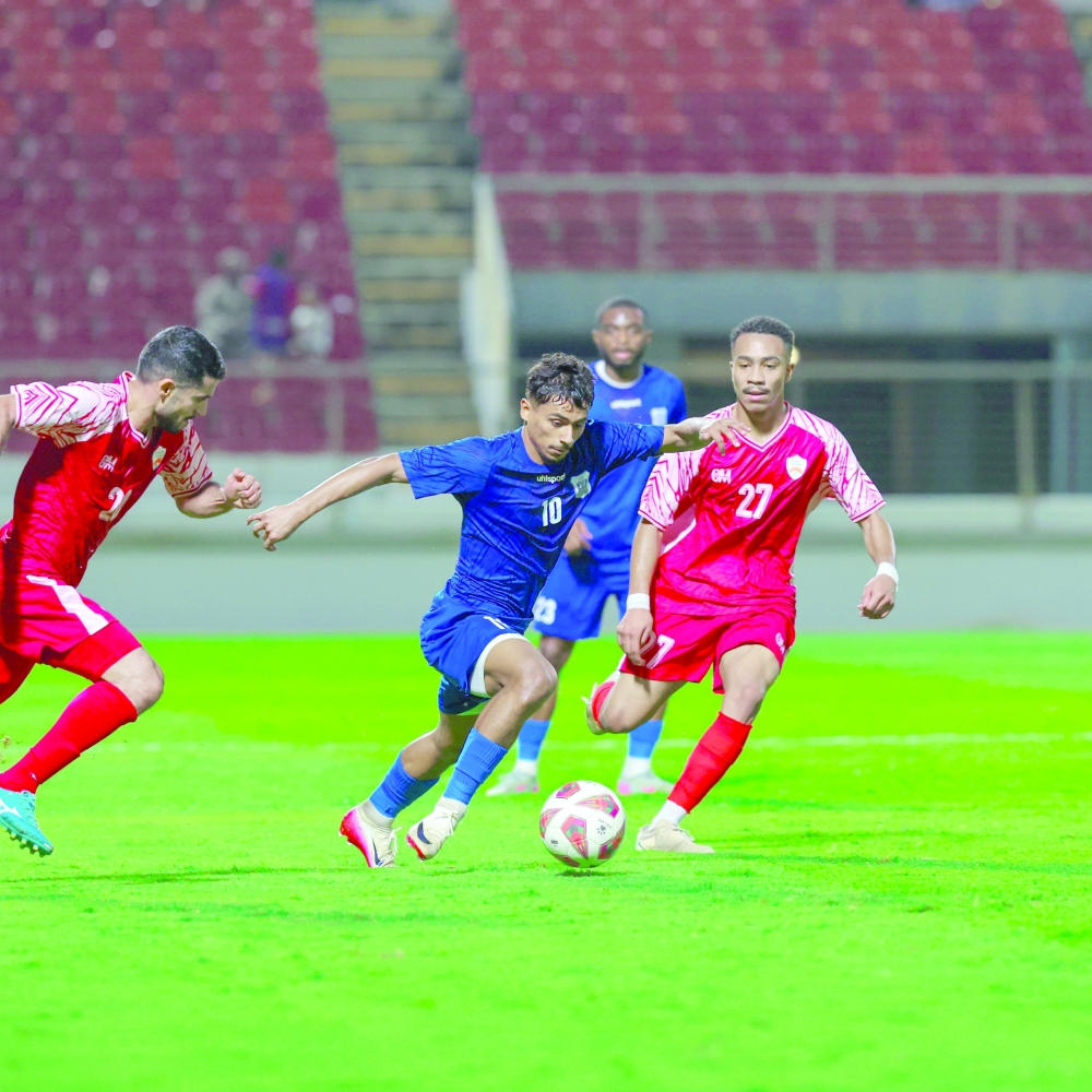 Oman Club and Al Nasr players in action during the Jetour Cup.