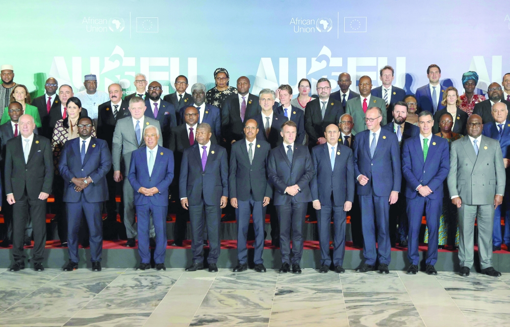 European and African leaders line up for the family photo, in Luanda. — AFP