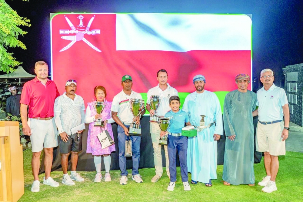 The winners in different categories pose with the chief guest and officials.