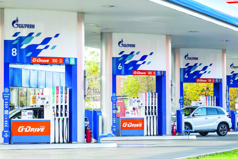 A car fuels up at a Gazprom gas station powered by the Naftna Industrija Srbije - NIS, in Belgrade. — AFP