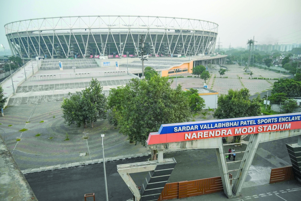 This photograph taken on November 20, 2025 shows the Narendra Modi Stadium, the world's largest cricket stadium, inside the Sardar Vallabhbhai Patel Sports Complex in Ahmedabad. The Indian city of Ahmedabad will stage the 2030 multi-sport Commonwealth Games, it was confirmed on November 26. The choice of Ahmedabad, also known as Amdavad, was ratified by a decision of the Commonwealth Sport General Assembly in Glasgow following a recommendation from the executive board. (Photo by Shammi MEHRA / AFP)
