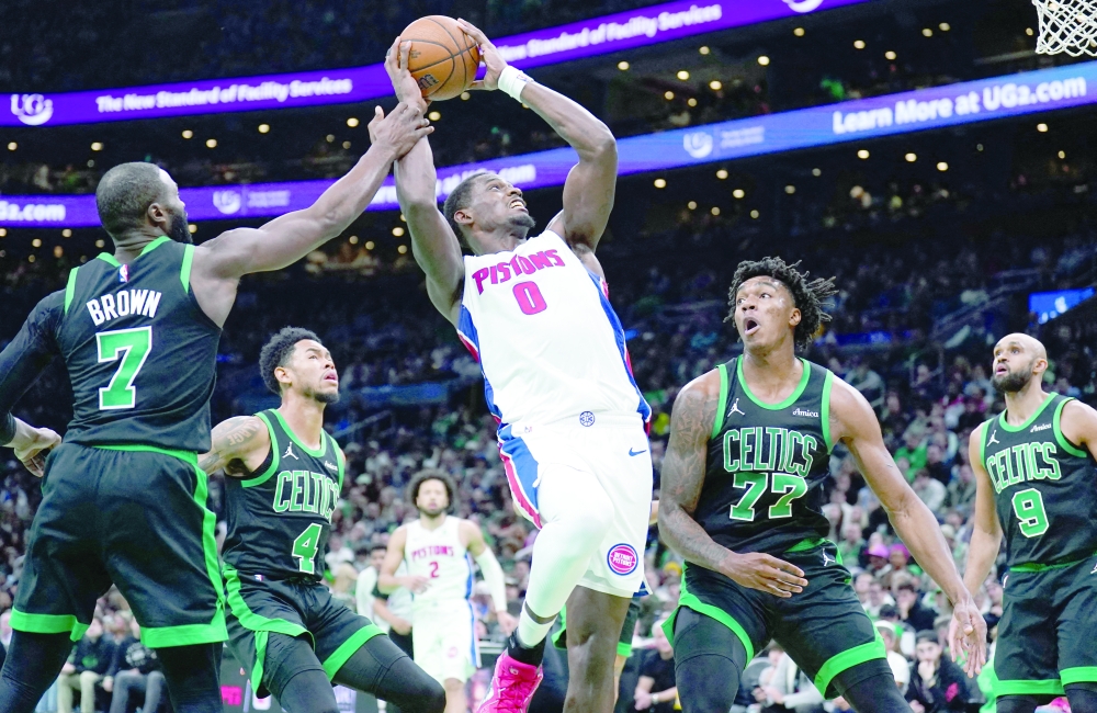 Boston Celtics guard Jaylen Brown (7) defends against Detroit Pistons centre Jalen Duren (0) in the first half at TD Garden. — Reuters
