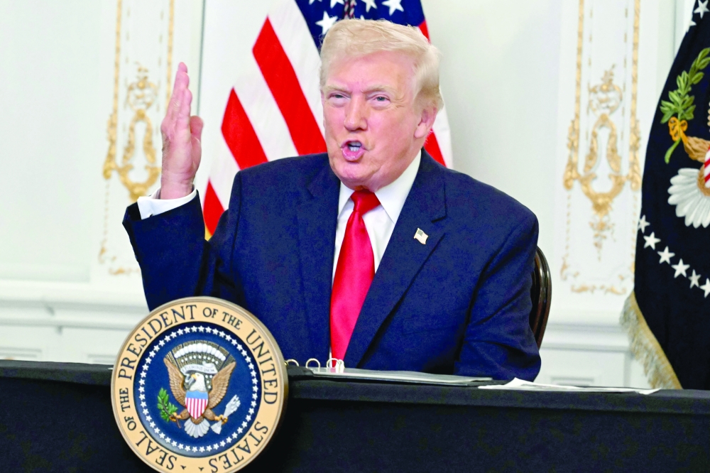 US President Donald Trump participates in a video call with military service members from his Mar-a-Lago residence in Palm Beach, Florida. — AFP