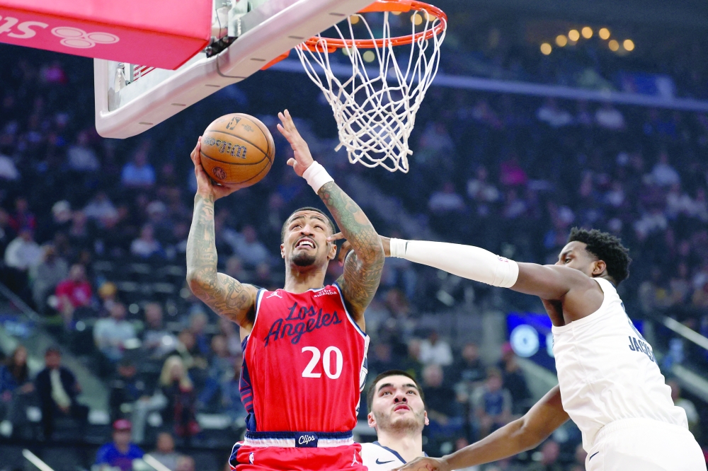 Los Angeles Clippers centre John Collins (20) shoots the ball against Memphis Grizzlies forward Jaren Jackson Jr (8). — Reuters