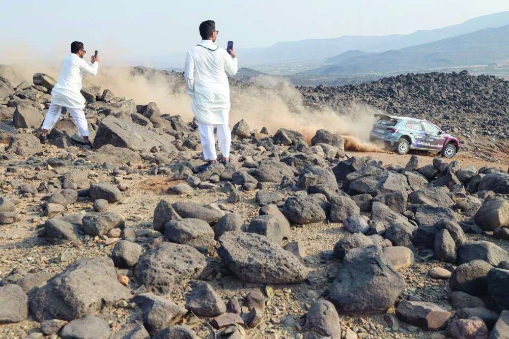 Qatari driver Abdulaziz al Kuwari and Italian co-driver Giovanni Bernacchini steer their Skoda Fabia RS during the third stage of FIA World Rally Championship (WRC) in Jeddah. — AFP