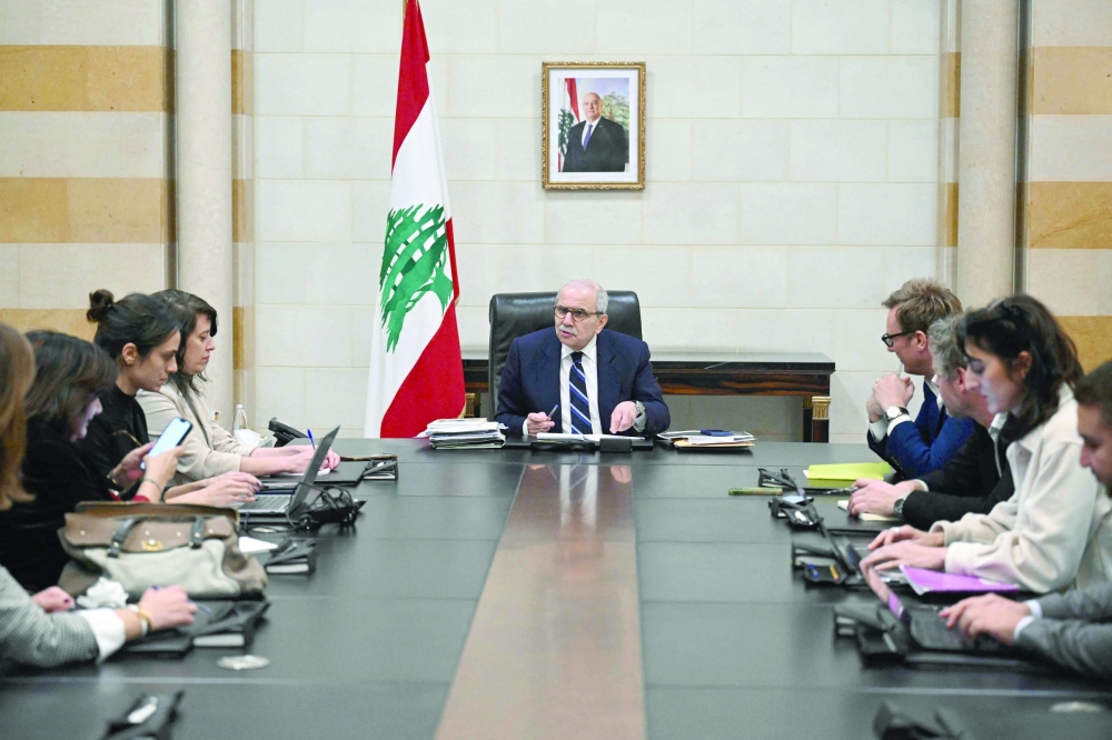 Lebanon's Prime Minister Nawaf Salam speaks to journalists working for foreign media and news agencies at the Government Palace in Beirut. - AFP