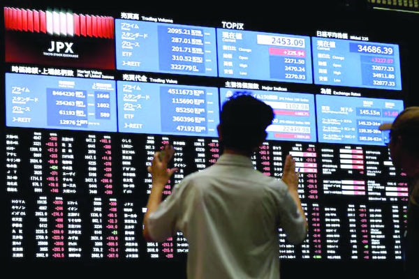 Japan leads Asian markets after strong JGB sale