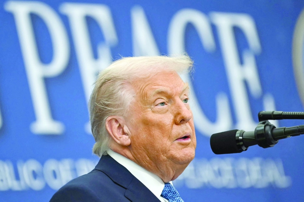 US President Donald Trump speaks during a signing ceremony of a peace deal with the President of Rwanda Paul Kagame and the President of the Democratic Republic of the Congo Felix Tshisekedi at the US Institute of Peace in Washington, DC. — AFP