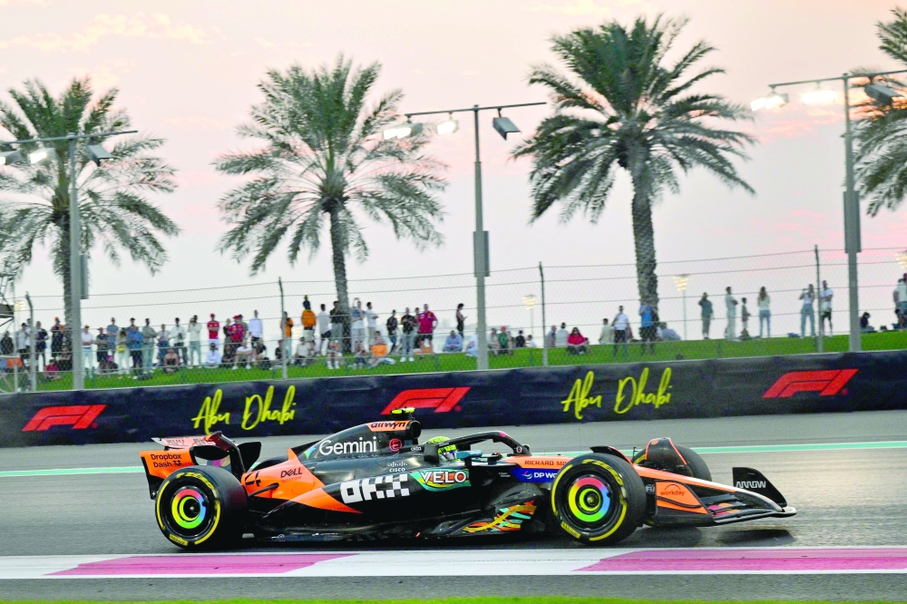McLaren's British driver Lando Norris drives during the second practice session ahead of the Abu Dhabi Formula One Grand Prix at the Yas Marina Circuit in Abu Dhabi on December 5, 2025.  (Photo by Andrej ISAKOVIC / AFP)
