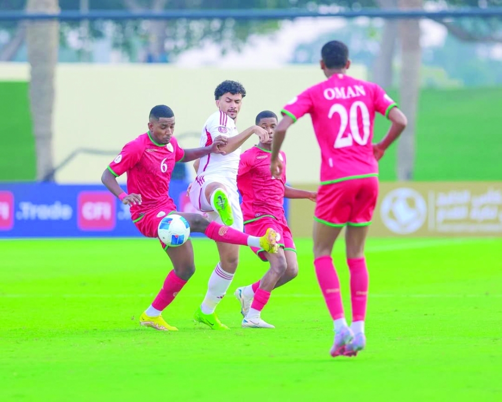 Oman and UAE players in action in Doha.