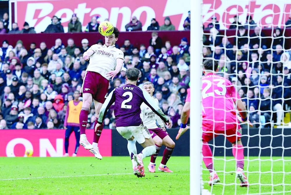 Arsenal's Declan Rice in action with Aston Villa's Matty Cash. — Reuters