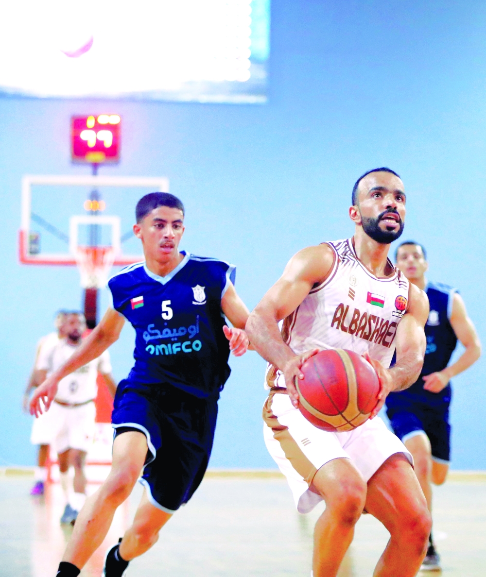 Al Bashayer and Masirah players fight for the ball. — Ammar al Musafir