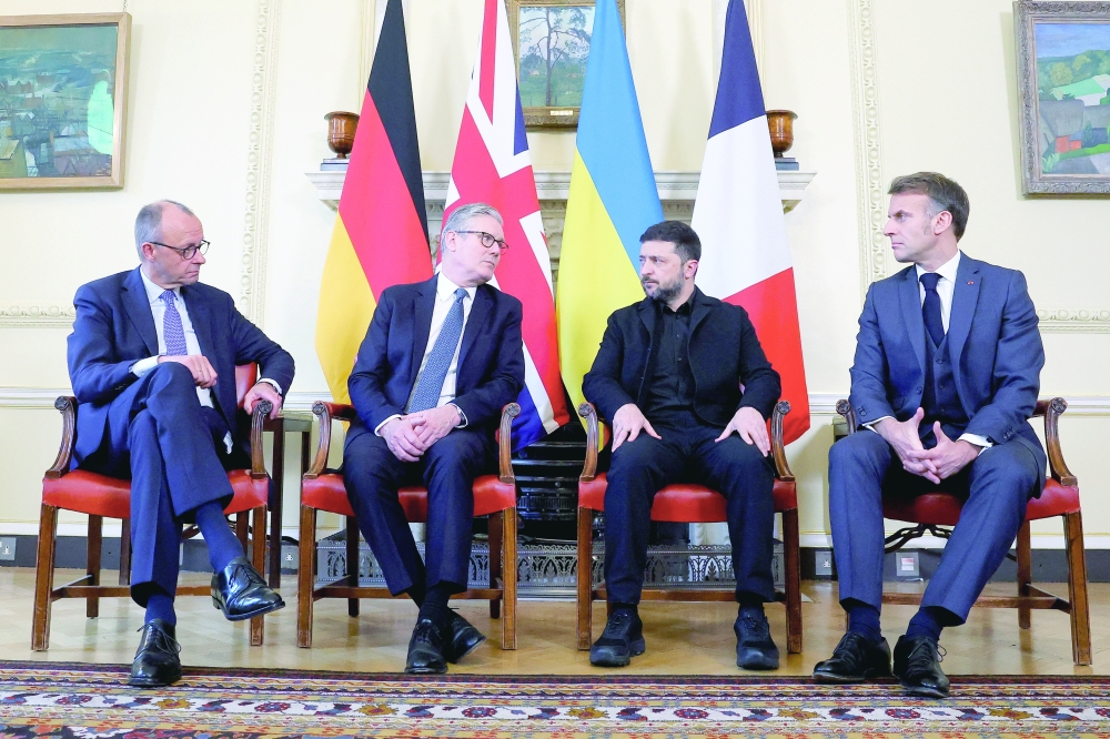 British PM Keir Starmer, Ukrainian President Volodymyr Zelenskiy, French President Emmanuel Macron, and German Chancellor Friedrich Merz meet at 10 Downing Street, in London. — Reuters