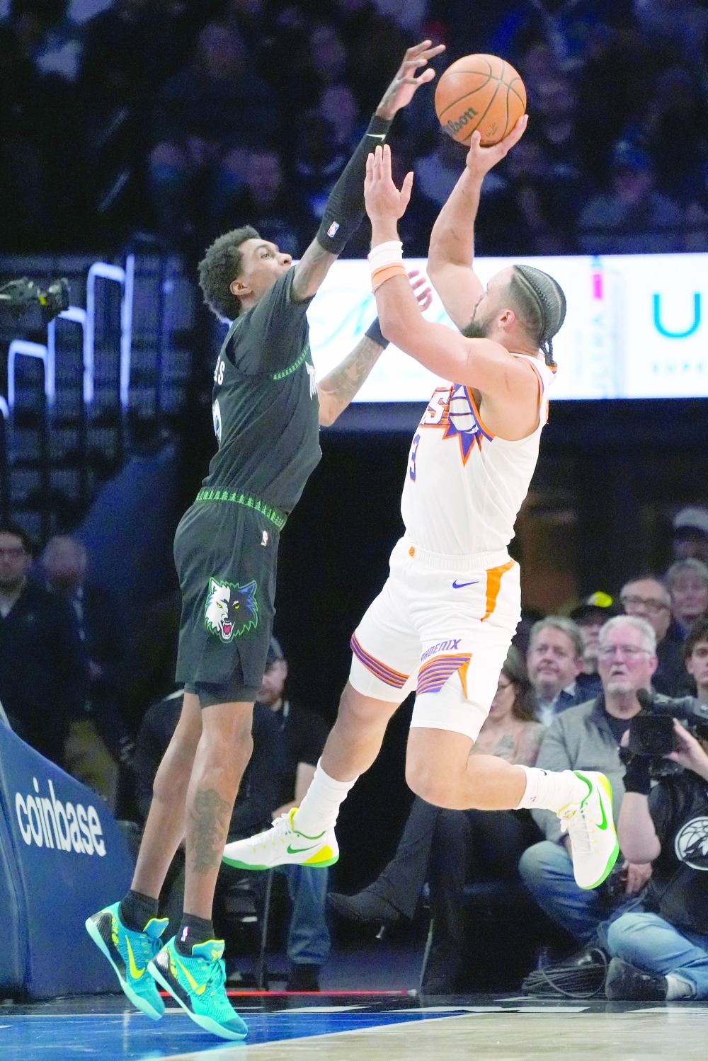 Phoenix Suns forward Dillon Brooks (3) works against Minnesota Timberwolves forward Jaden McDaniels (3). — Reuters 