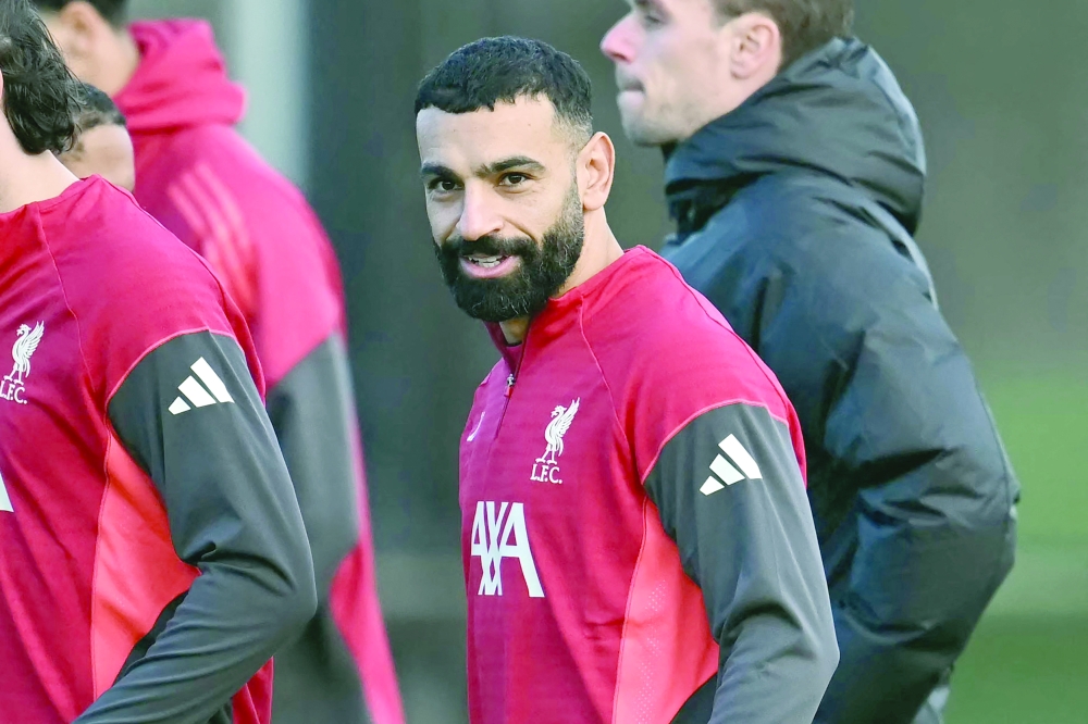 Liverpool's Egyptian striker #11 Mohamed Salah attends a team training session at their training ground in Kirkby, Liverpool, north-west England on December 8, 2025, on the eve of their UEFA Champions League, league phase football match against Inter Milan in Milan. Mohamed Salah plunged his future at Liverpool into serious doubt after claiming he had been made the fall guy for the Premier League champions' disastrous form this season. (Photo by Paul ELLIS / AFP)
