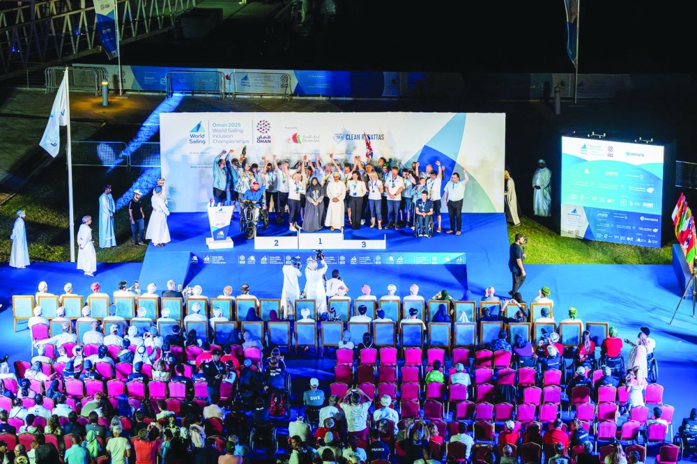 Overall team champions pose on the podium.