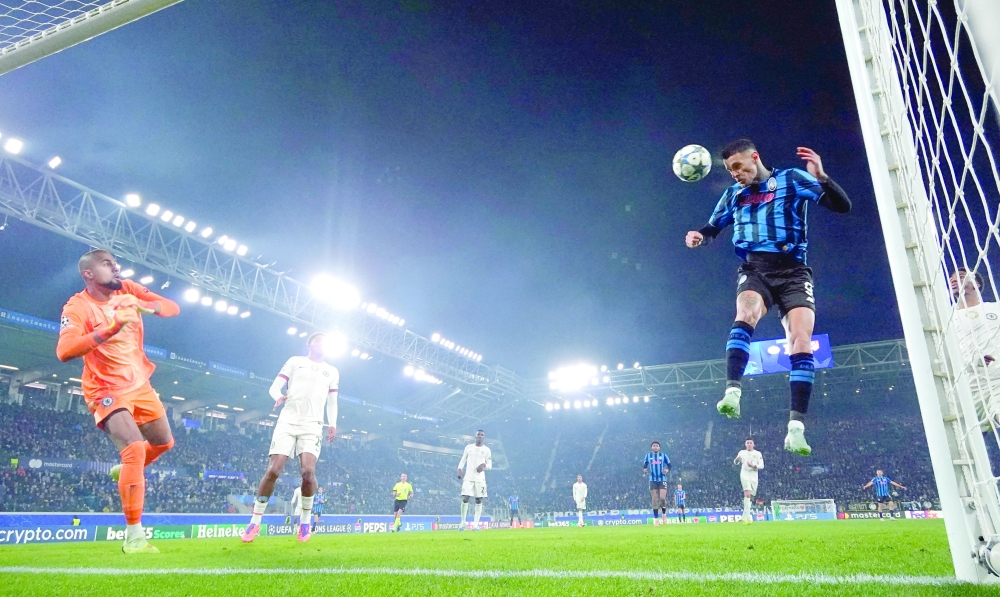 Atalanta's Gianluca Scamacca scores their first goal. — Reuters