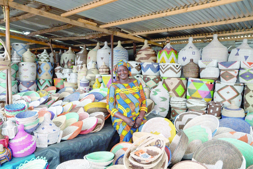 Shopkeeper Fatim Ndoye inside her shop in Ndiakhaté Ndiassane. — AFP