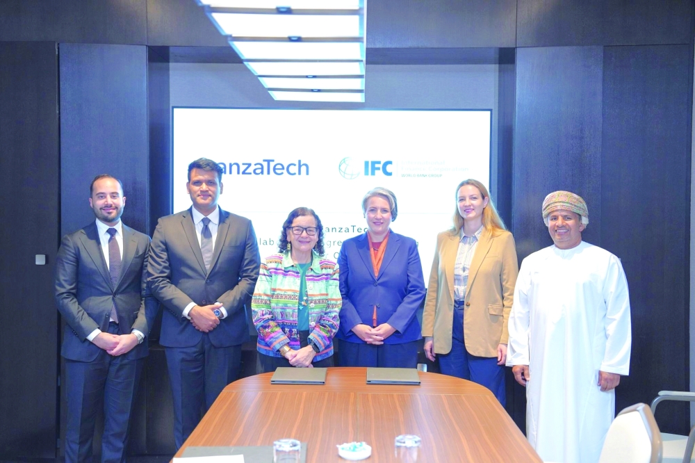 Representatives of IFC / World Bank Group and LanzaTech at the agreement signing in Muscat. 