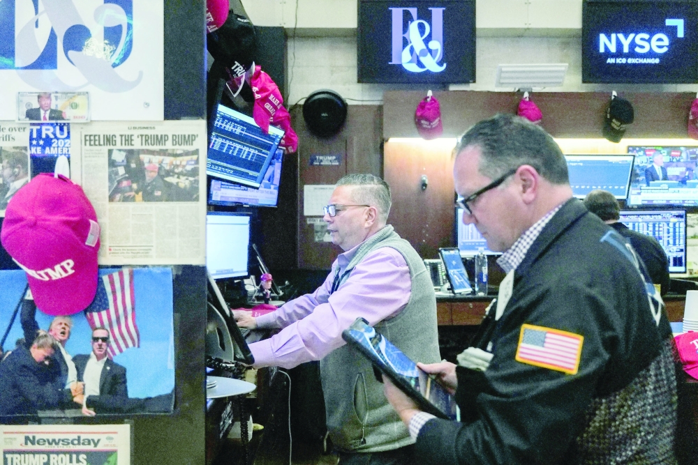 Traders work on the floor at the New York Stock Exchange (NYSE) in New York City, US. — Reuters