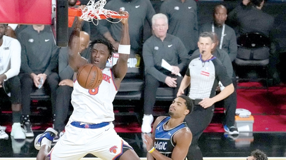New York Knicks forward Og Anunoby (8) goes up for the dunk as Orlando Magic guard Jett Howard (13) and forward Tristan da Silva (23) look on. — Reuters