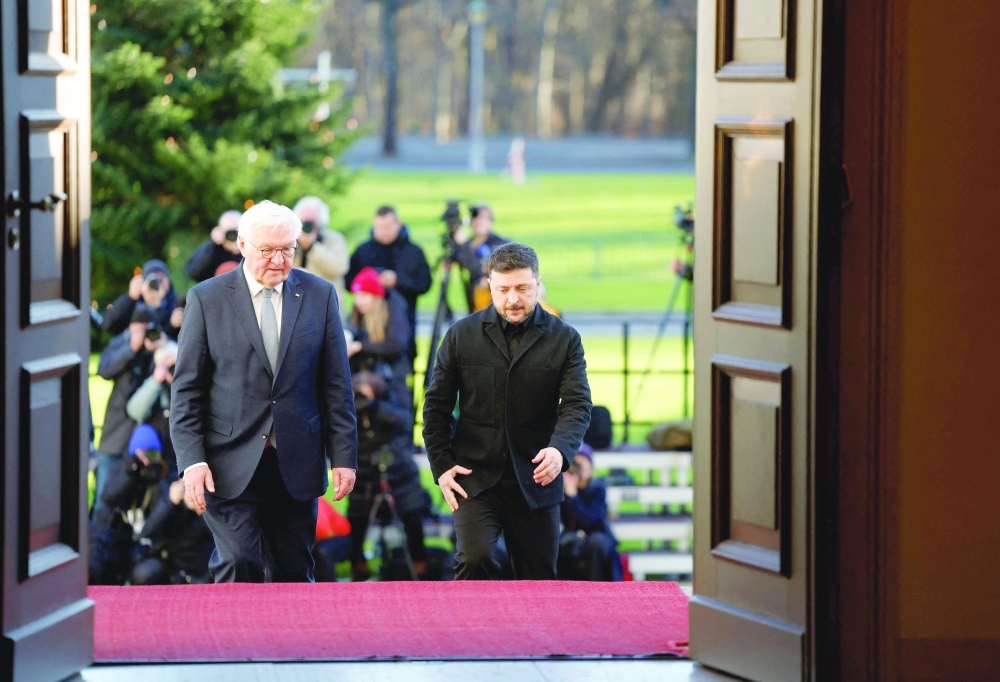 German President Frank-Walter Steinmeier (L) welcomes Ukraine's President Volodymyr Zelensky at the presidential Bellevue Palace in Berlin. — AFP