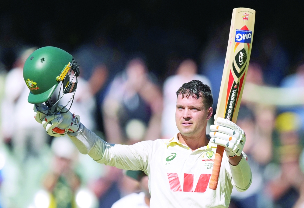 Australia's Alex Carey celebrates after reaching his century during the third Ashes Test against England at Adelaide Oval, Australia. — Reuters