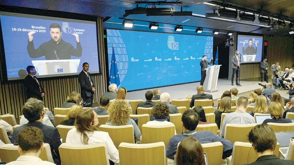 Ukraine's President Volodymyr Zelensky speaks during a press conference as part of the European Council meeting in Brussels. — AFP