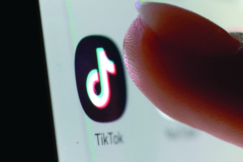 The TikTok app icon on a smartphone in this illustration. — Reuters File