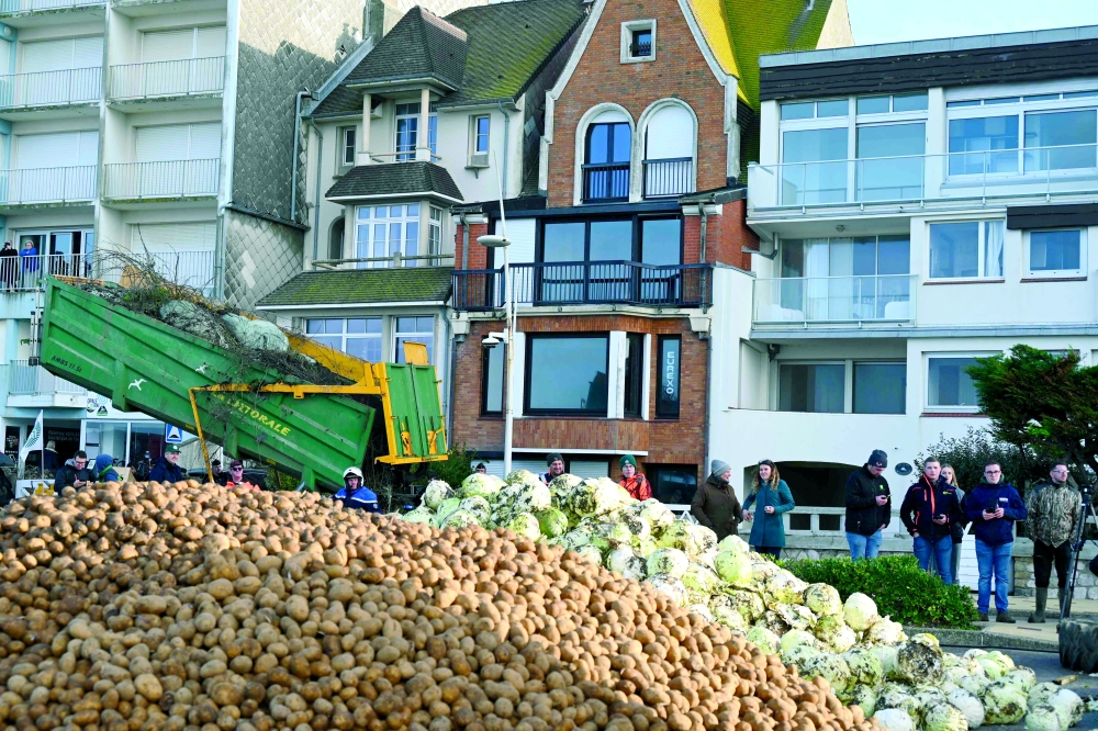 Potatoes and cabbages are displayed by farmers unions outside the house of French President in the coastal city of Le Touquet to protest against the EU-Mercosur deal and the French government's management of the lumpy skin disease (LSD) outbreak. — AFP