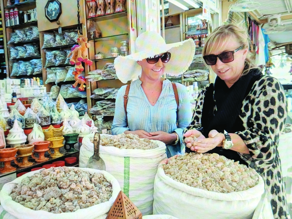 Sabine Cunningham-Blinn with her friend at the frankincense souq in Salalah