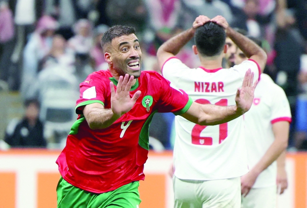 Soccer Football - FIFA Arab Cup - Qatar 2025 - Final - Jordan v Morocco - Lusail Stadium, Lusail, Qatar - December 18, 2025 Morocco's Abderazak Hamdallah celebrates scoring their third goal REUTERS/Mohammed Salem     TPX IMAGES OF THE DAY
