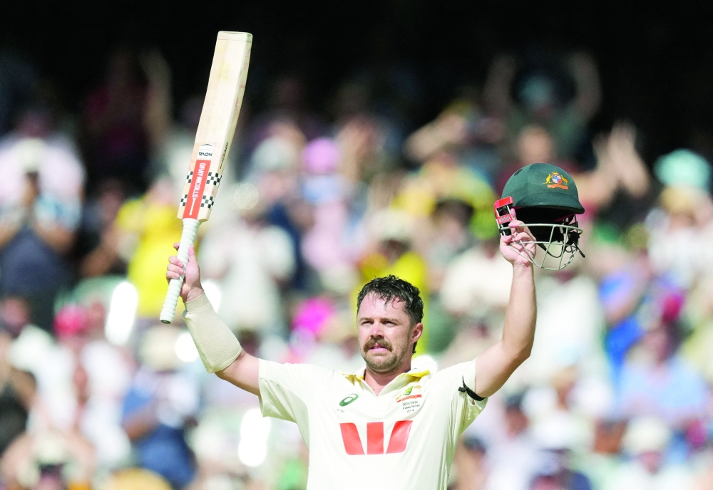 Cricket - The Ashes - Australia v England - Third Test - Adelaide Oval, Adelaide, Australia - December 19, 2025 Australia's Travis Head celebrates after reaching his century REUTERS/Asanka Brendon Ratnayake
