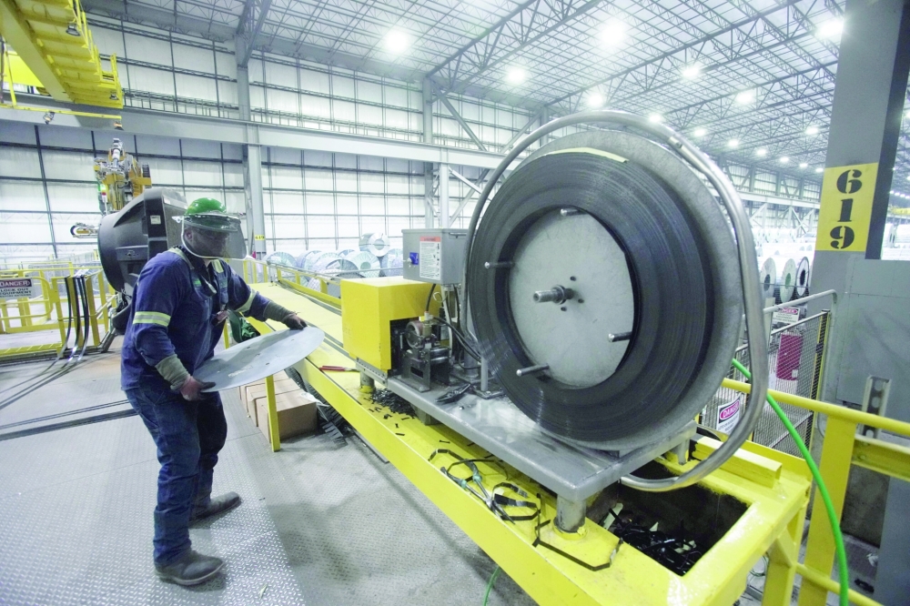 An employee works inside a steel factory in Blytheville, Arkansas. — Reuters