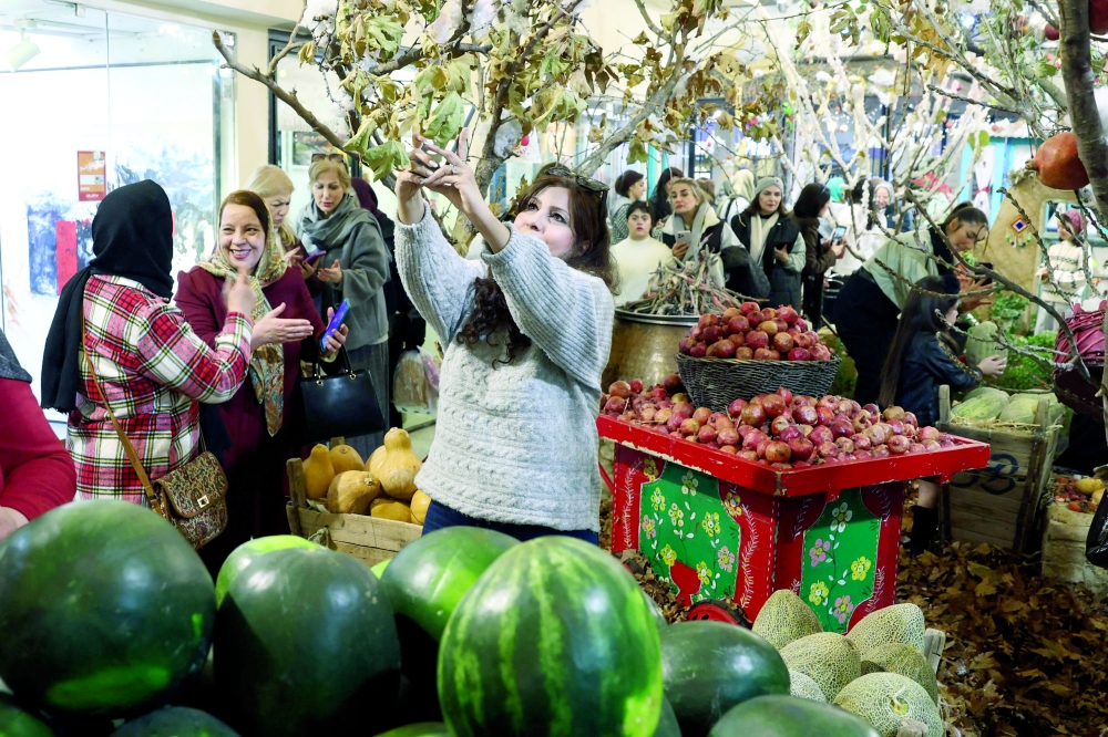 Iranians celebrate with Yalda decoration in northern Tehran. — AFP