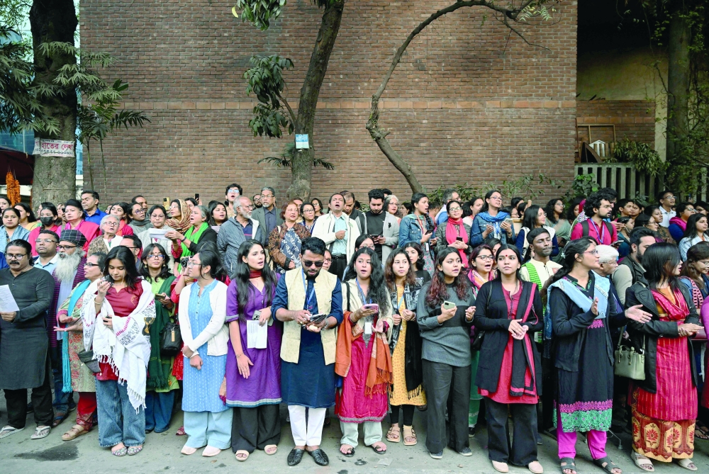 People take part in a protest organised in Dhaka. — AFP