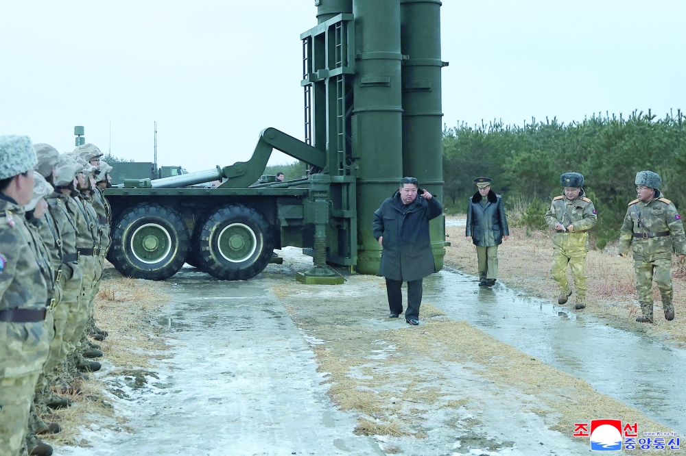 North Korean leader Kim Jong Un visits the site of a test-firing near the East Sea. — Reuters