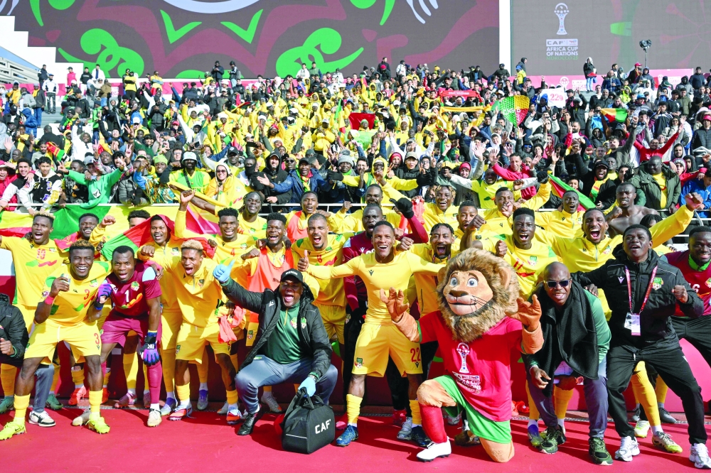 Benin's players celebrate after the Africa Cup of Nations (CAN) Group D football match between Benin and Botswana. — AFP