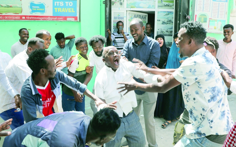 Somalis debate on the streets after Israel became the first country to formally recognise the self-declared Republic of Somaliland as an independent and sovereign state in Mogadishu. - Reuters 