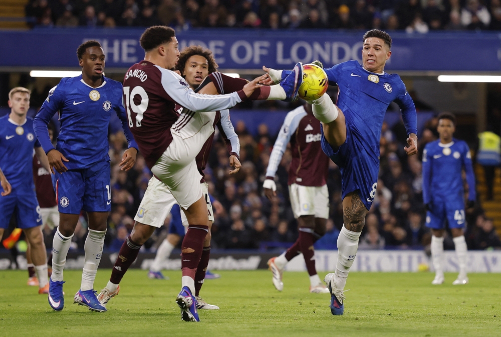 Chelsea's Enzo Fernandez in action with Aston Villa's Jadon Sancho 